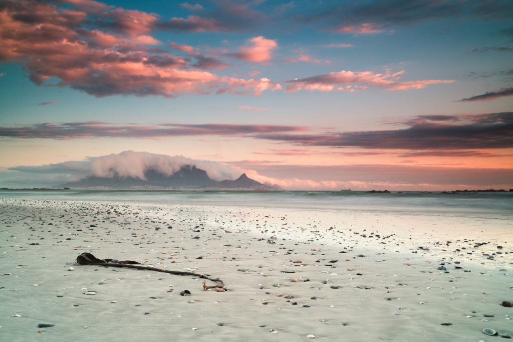 Beautiful scenery of the beach and the sea of Cape Town, South Africa with breathtaking clouds